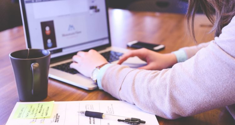 Best Free Blog Sites Girl Typing on Laptop
